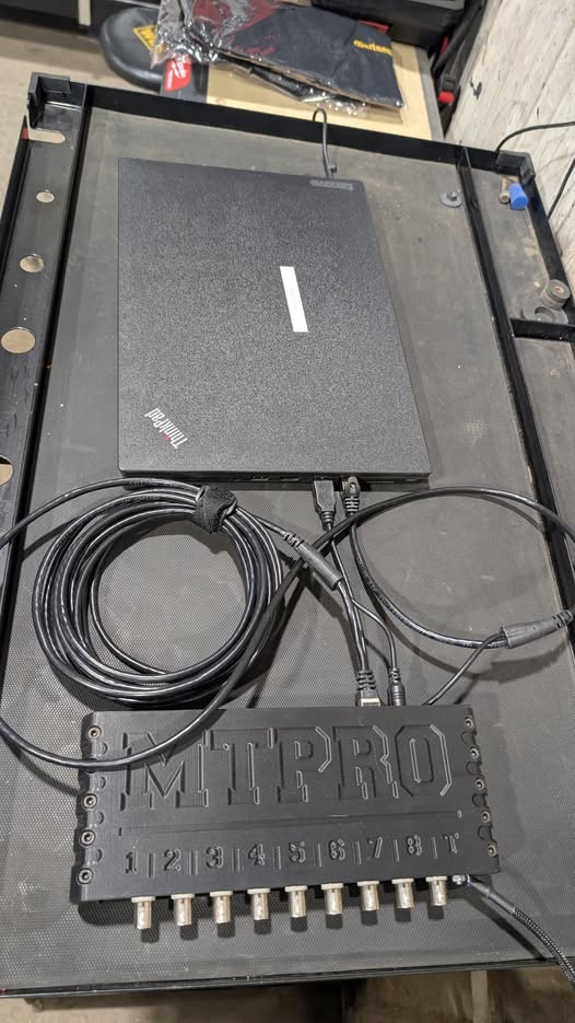MTPro4 eight-channel automotive lab scope wired to a ThinkPad laptop