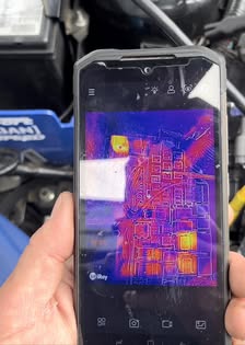 Thermal infrared image of a circuit board shown on a phone